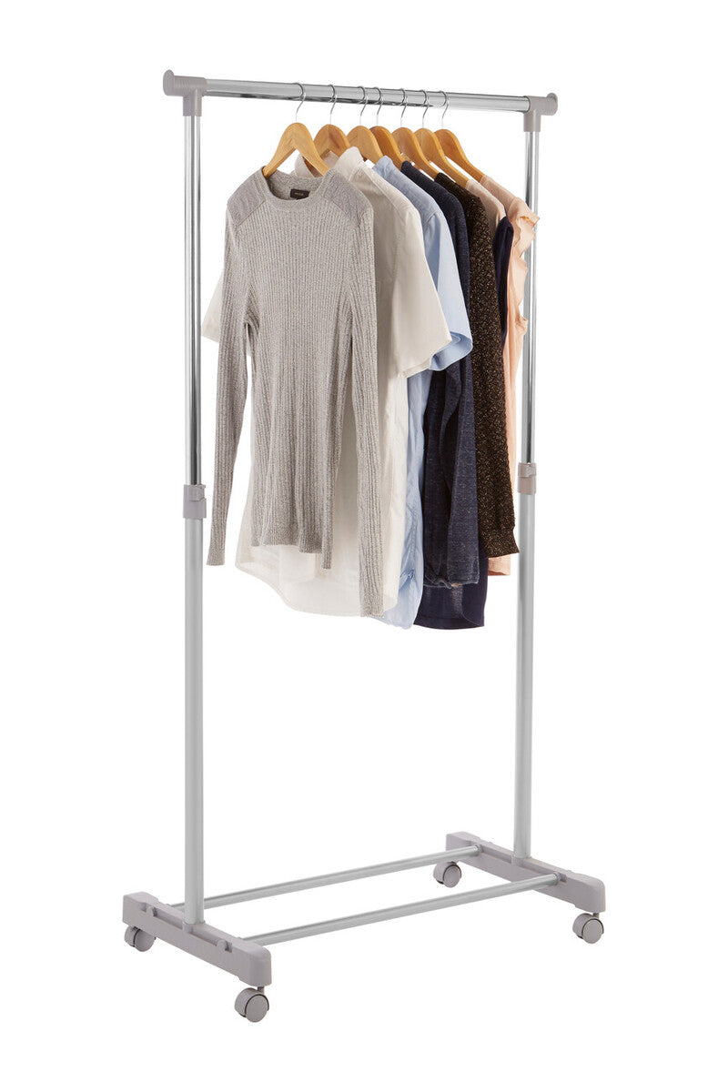 Clothing rack with clothes on a white background