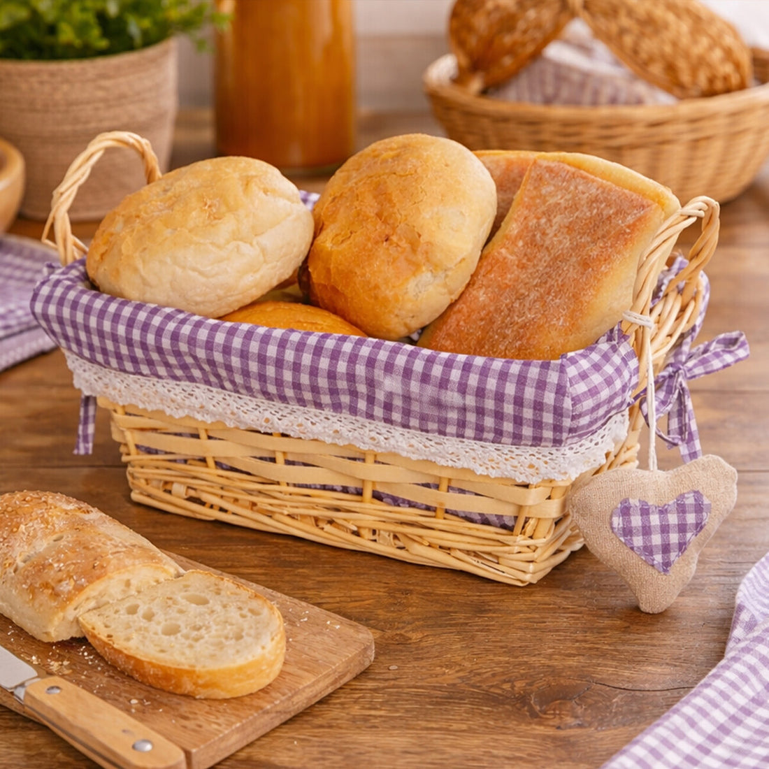 Basket of bread with a checkered cloth on a wooden table