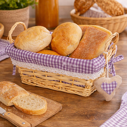 Basket of bread with a checkered cloth on a wooden table