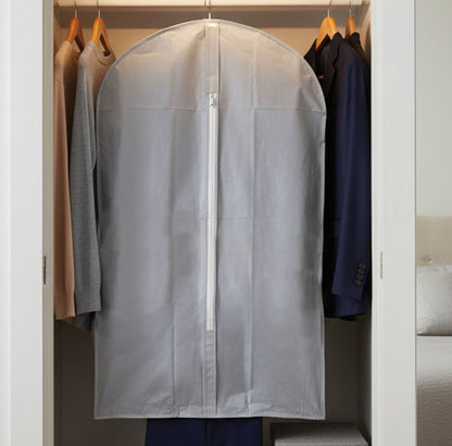 Clear garment bag with zipper in a closet with clothes and shoes.