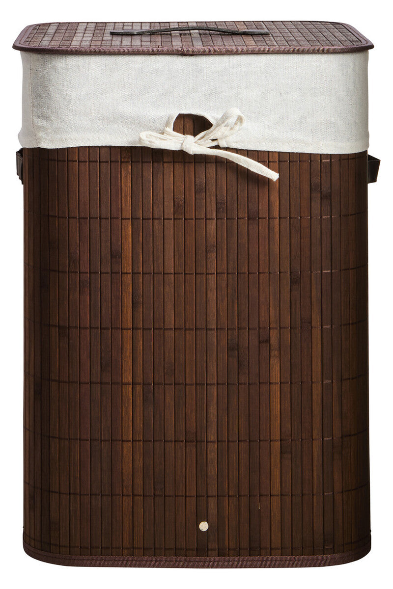 Brown woven laundry basket with a white liner on a white background