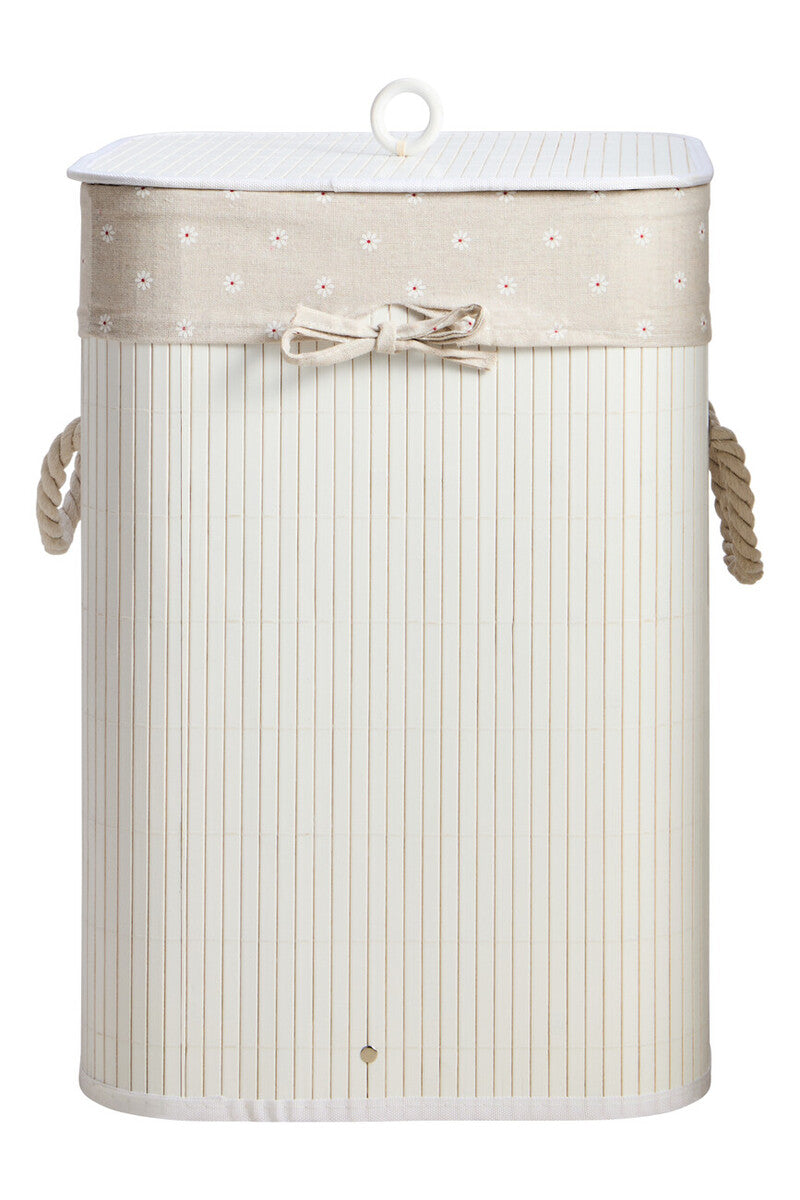 Beige laundry basket with rope handles and decorative trim on a white background