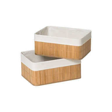 Two woven storage baskets with white interiors on a white background