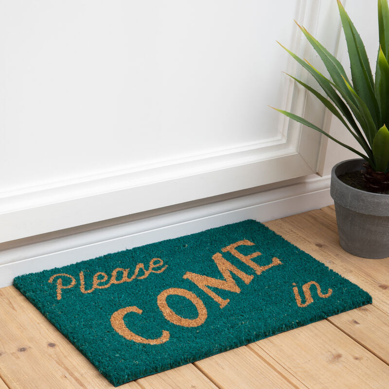 Green doormat with &