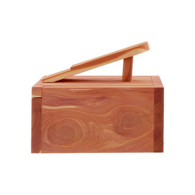 Wooden box with a lid on a white background