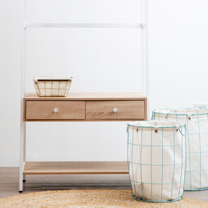 Wooden dresser with drawers and a basket on a white background