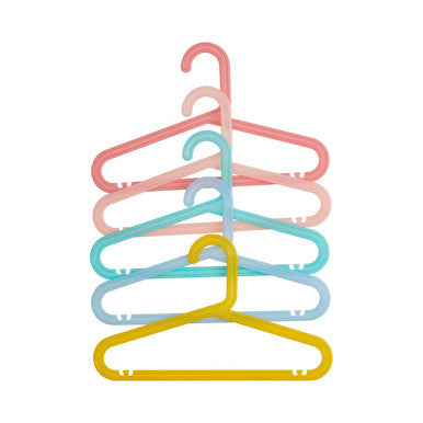 Set of colorful hangers in pink, blue, and yellow on a white background