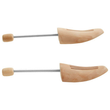 Two wooden shoe trees with metal rods on a white background