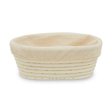 Woven bread proofing basket on a white background