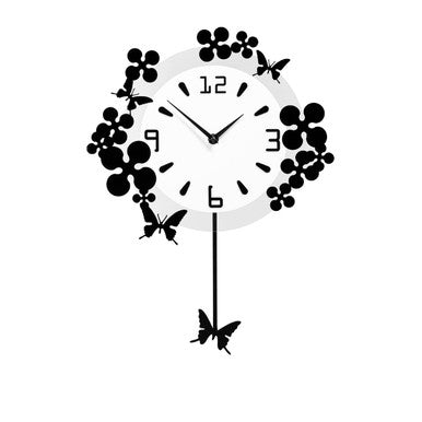 Decorative wall clock with butterfly design on a white background