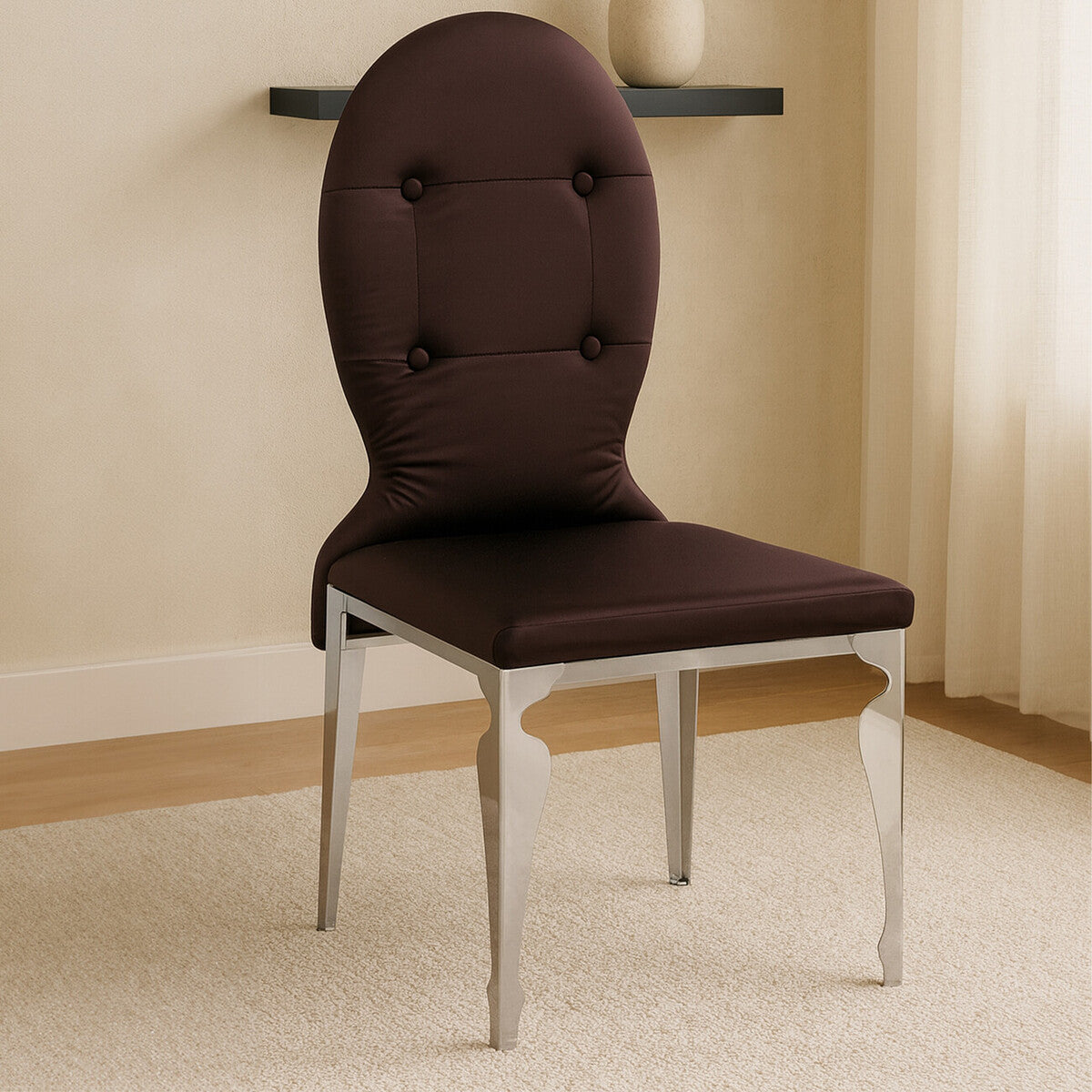 Brown upholstered chair with metal legs in a room setting