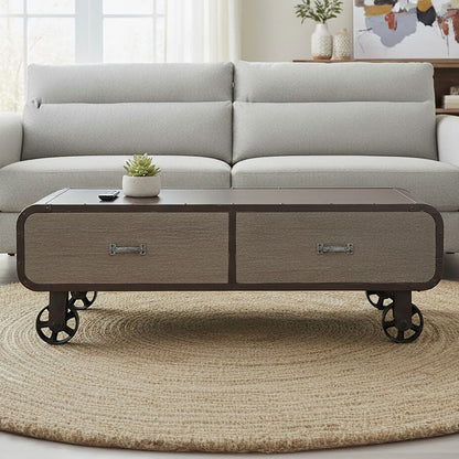 Gray sofa with a wooden coffee table in a living room setting.