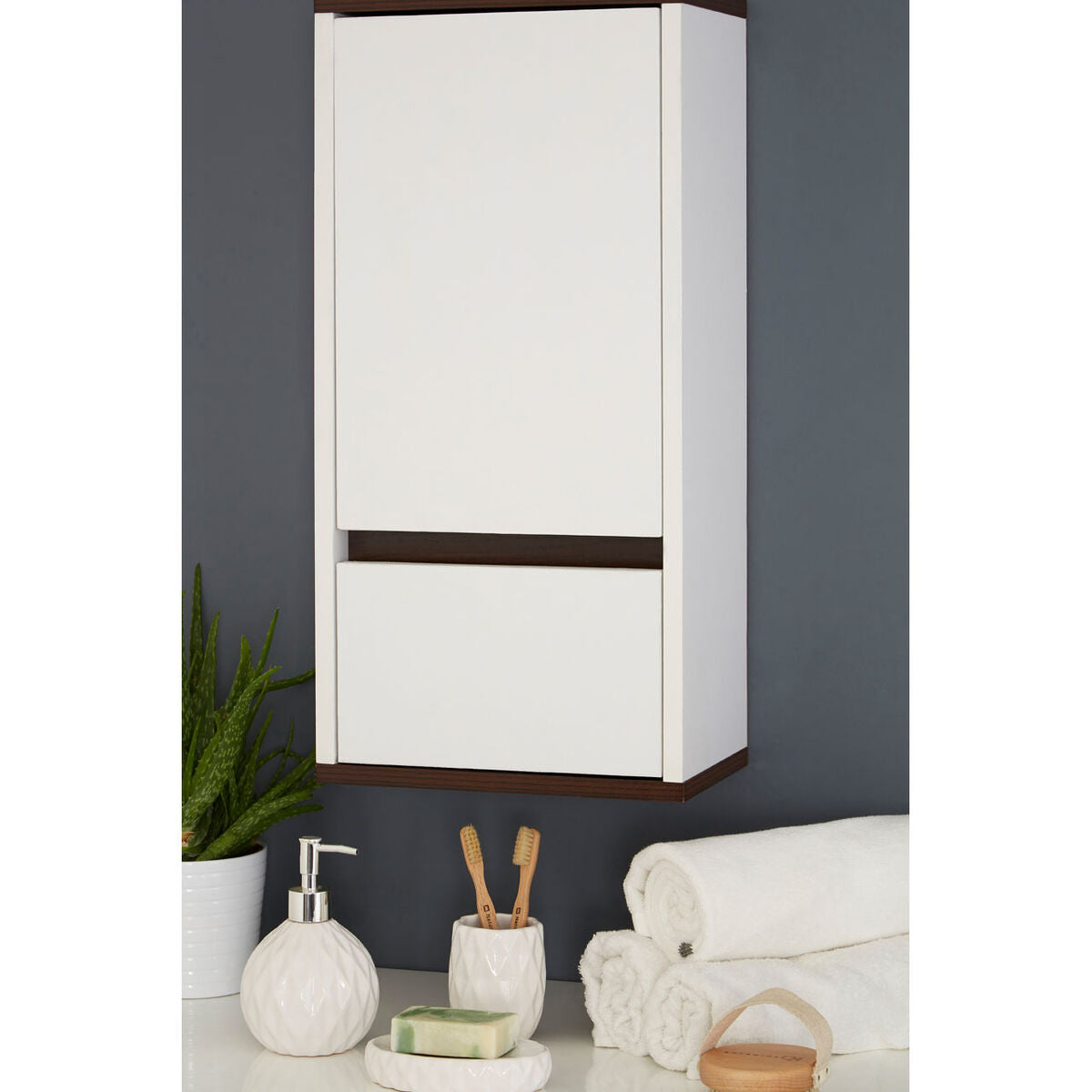White wall-mounted cabinet with wooden accents in a bathroom setting.