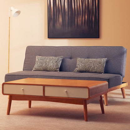 Modern living room with a gray sofa, wooden coffee table, and abstract art on the wall.