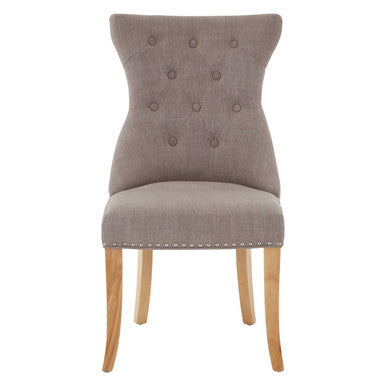Gray upholstered chair with wooden legs on a white background