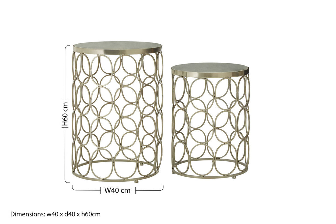 Two metallic side tables with circular patterns and dimensions displayed.