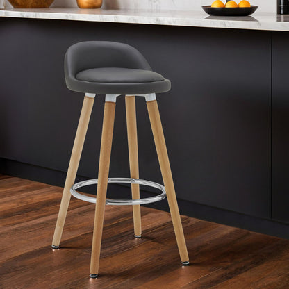 Gray bar stool with wooden legs in a kitchen setting