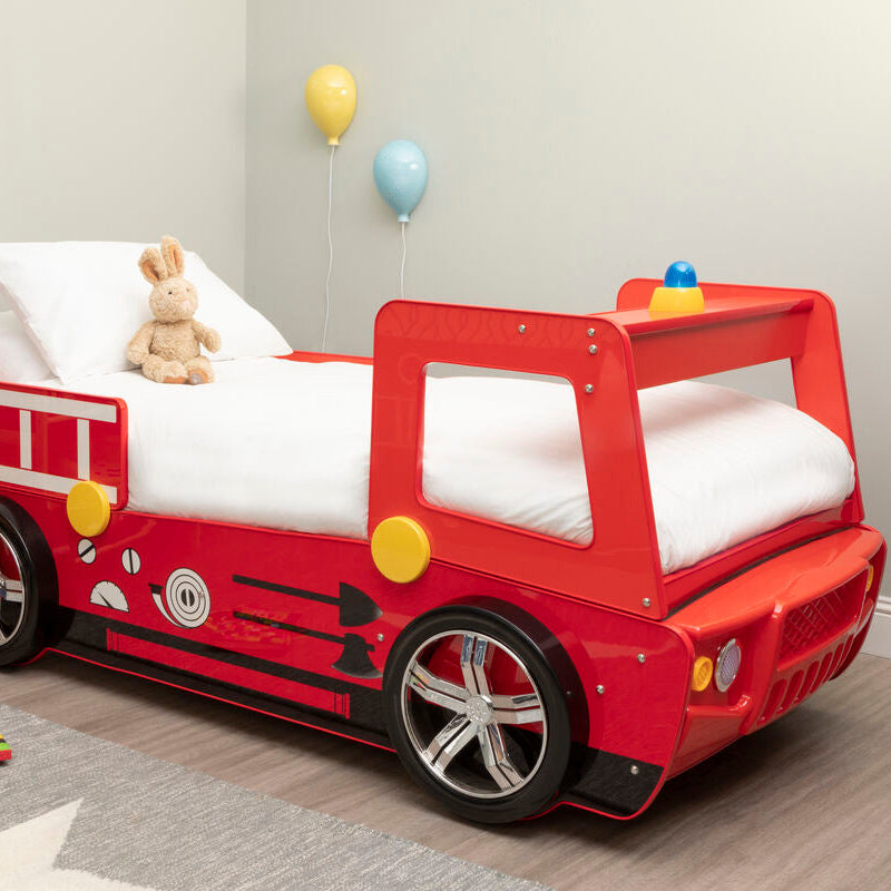Red fire truck bed in a child&