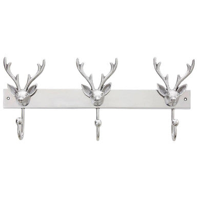 Decorative wall hook with deer head designs on a white background
