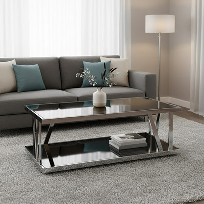 Modern living room with a gray sofa and glass coffee table.