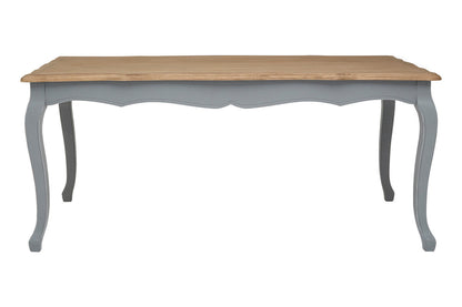 Dining table with wooden top and gray base on a white background