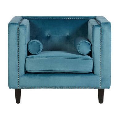 Blue armchair with tufted backrest and nailhead trim on a white background