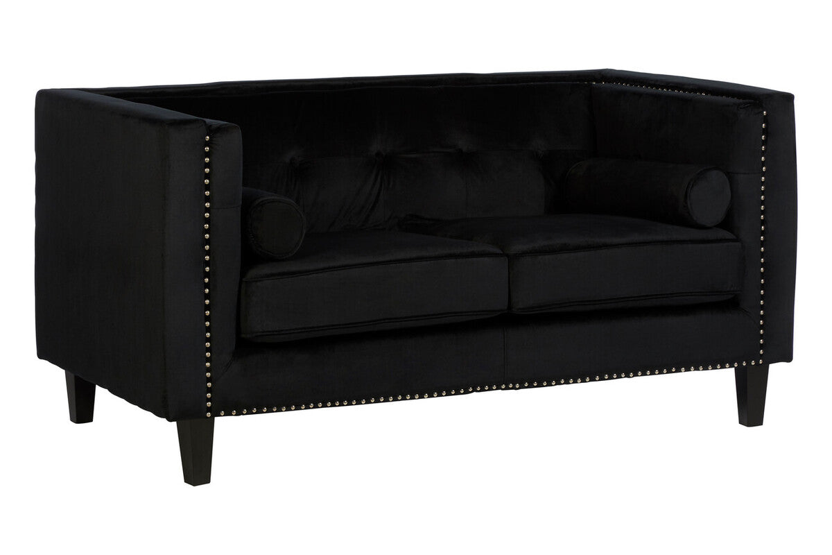 Black tufted sofa with nailhead trim on a white background