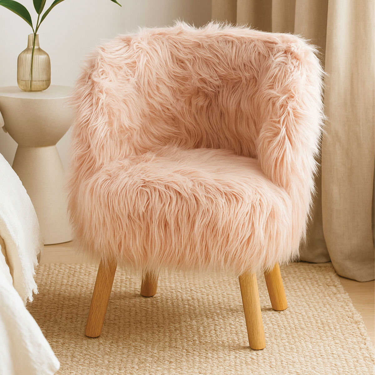 Pink fluffy chair with wooden legs in a room setting