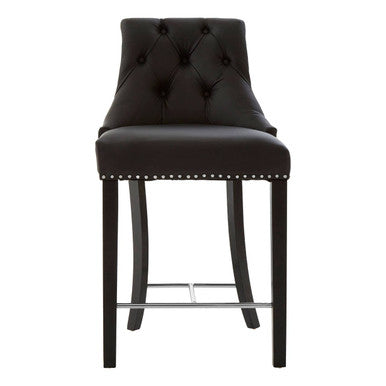 Black bar stool with tufted backrest and nailhead trim on a white background