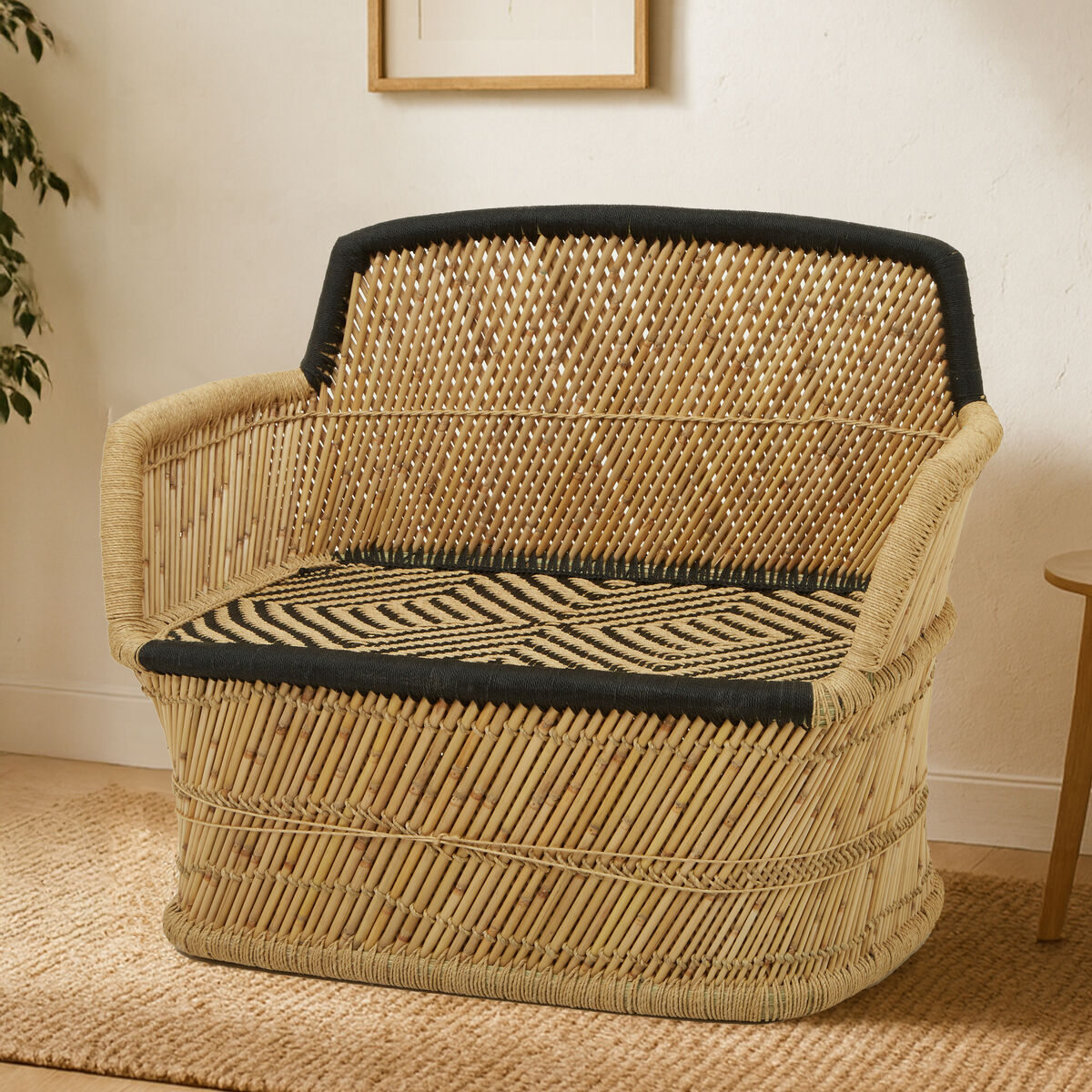 Woven chair with black accents in a room setting