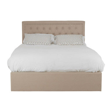 Beige upholstered bed with white bedding on a white background