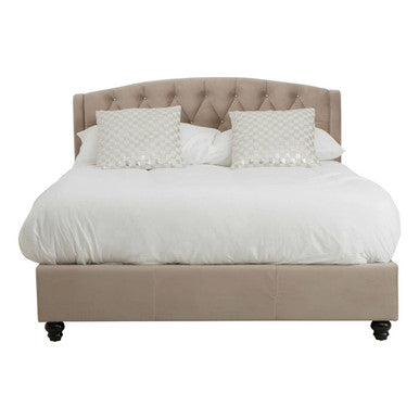 Beige upholstered bed with white bedding on a white background