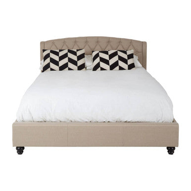 Beige upholstered bed with a geometric headboard on a white background