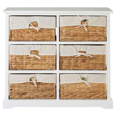 White dresser with six wicker baskets on a white background