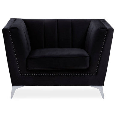 Black armchair with nailhead trim on a white background