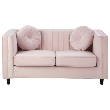 Pink sofa with two cushions on a white background