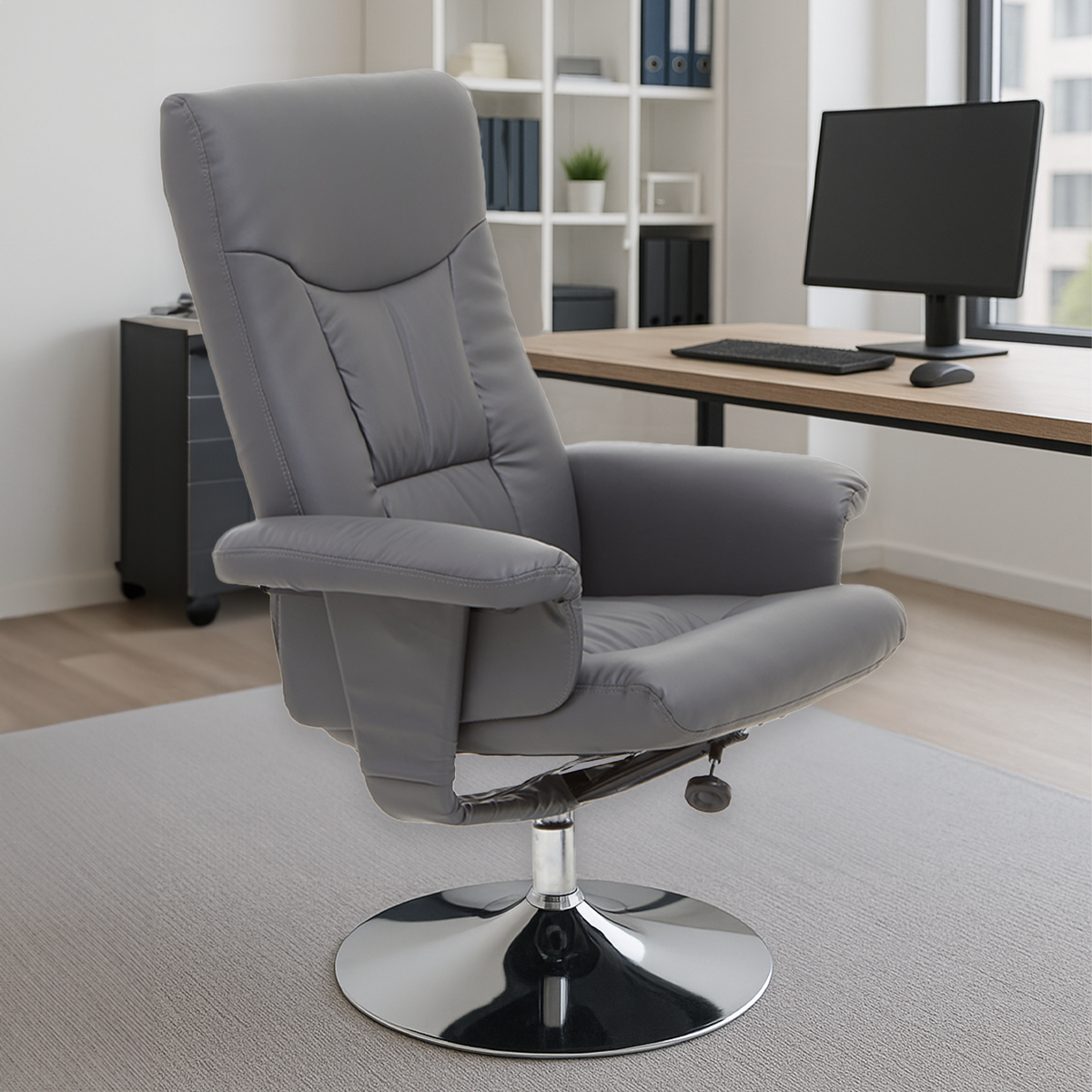 Gray recliner chair in a home office setting with a desk and computer.