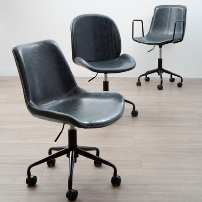 Three office chairs with black leather and metal bases on a wooden floor.