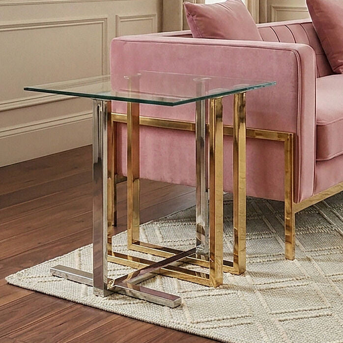 Pink sofa in a stylish living room with a glass side table.