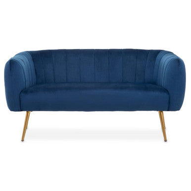 Blue velvet sofa with gold legs on a white background