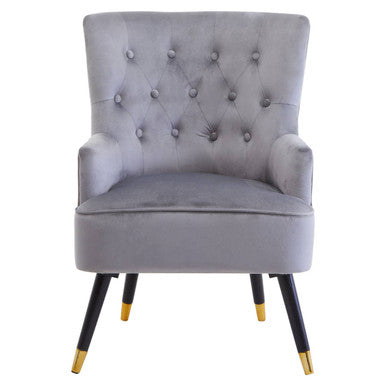 Gray upholstered chair with tufted backrest and gold feet on a white background