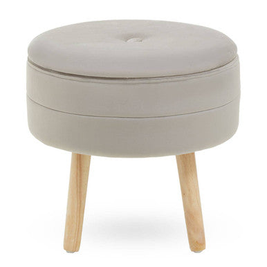 Round beige ottoman with wooden legs on a white background
