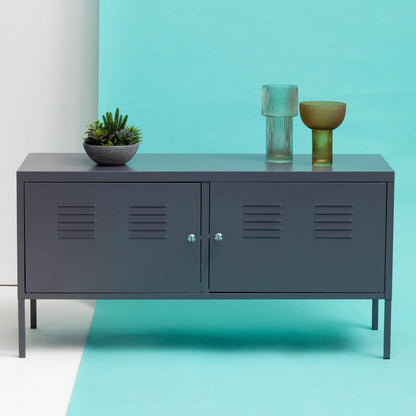 Gray metal cabinet with decorative items on a teal background