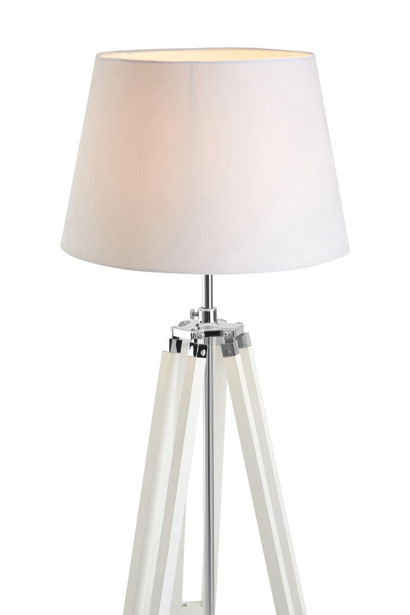 White floor lamp with a tripod base on a white background