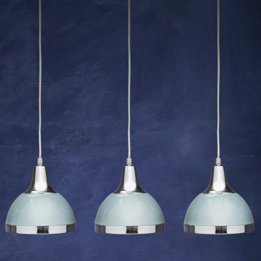 Three pendant lights with light blue shades and chrome bases against a dark blue background