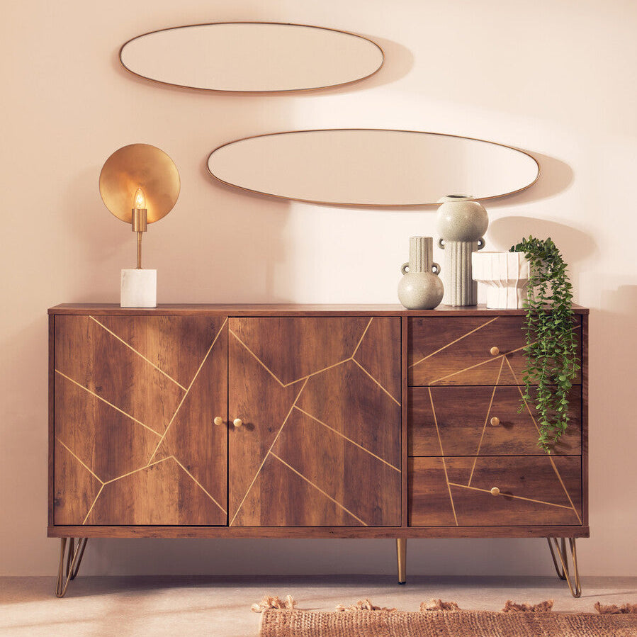 Wooden sideboard with geometric design in a room with decorative elements.