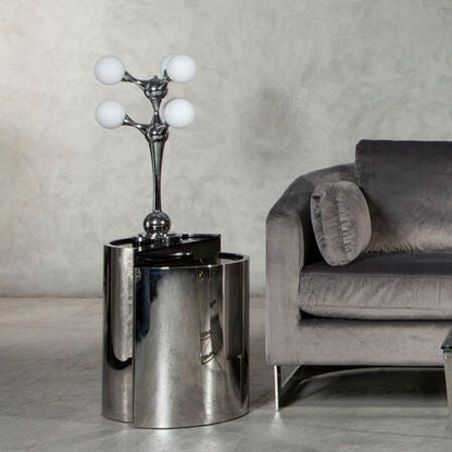 Gray sofa with a coffee table and ottoman in a modern room.