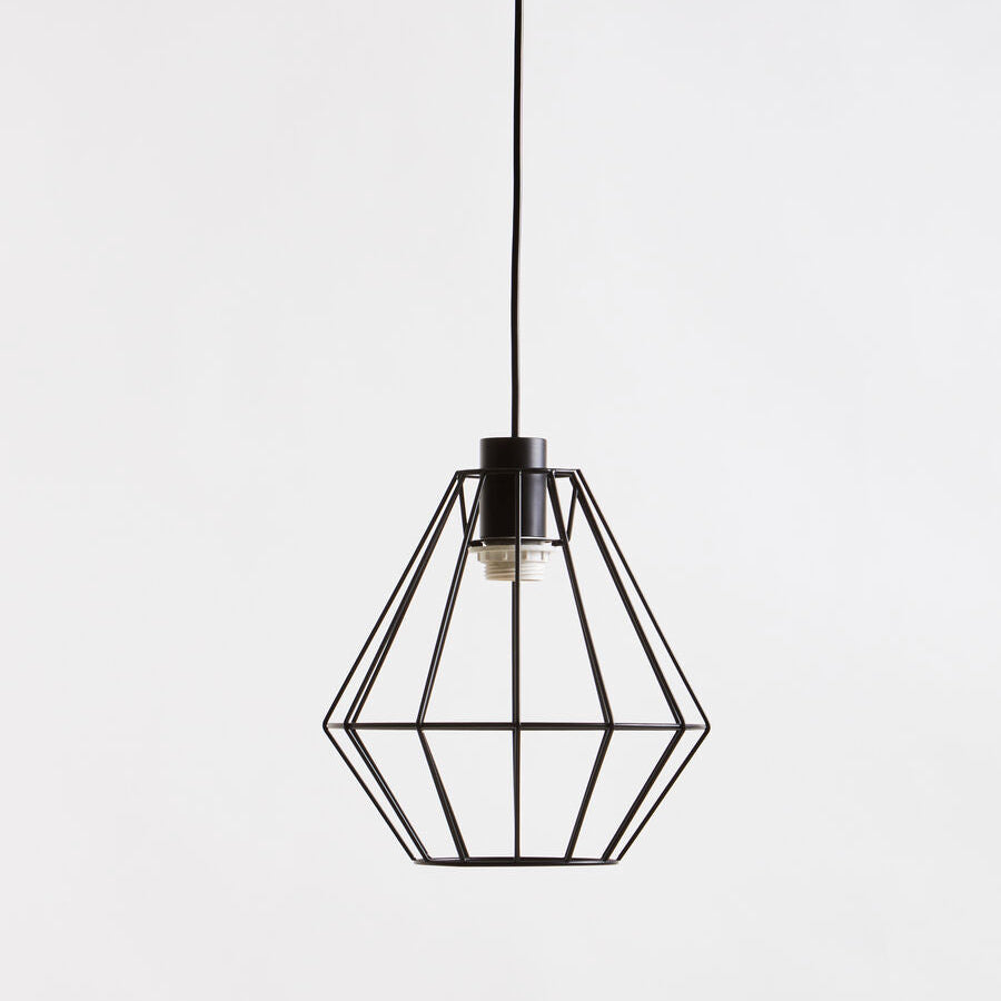 Black geometric pendant light on a white background