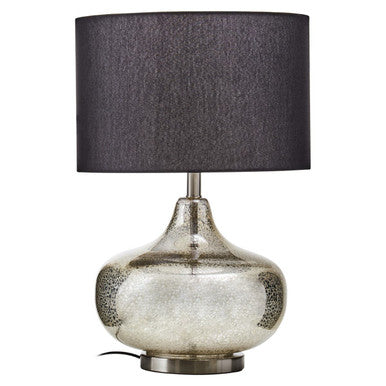 Table lamp with a black shade and silver base on a white background