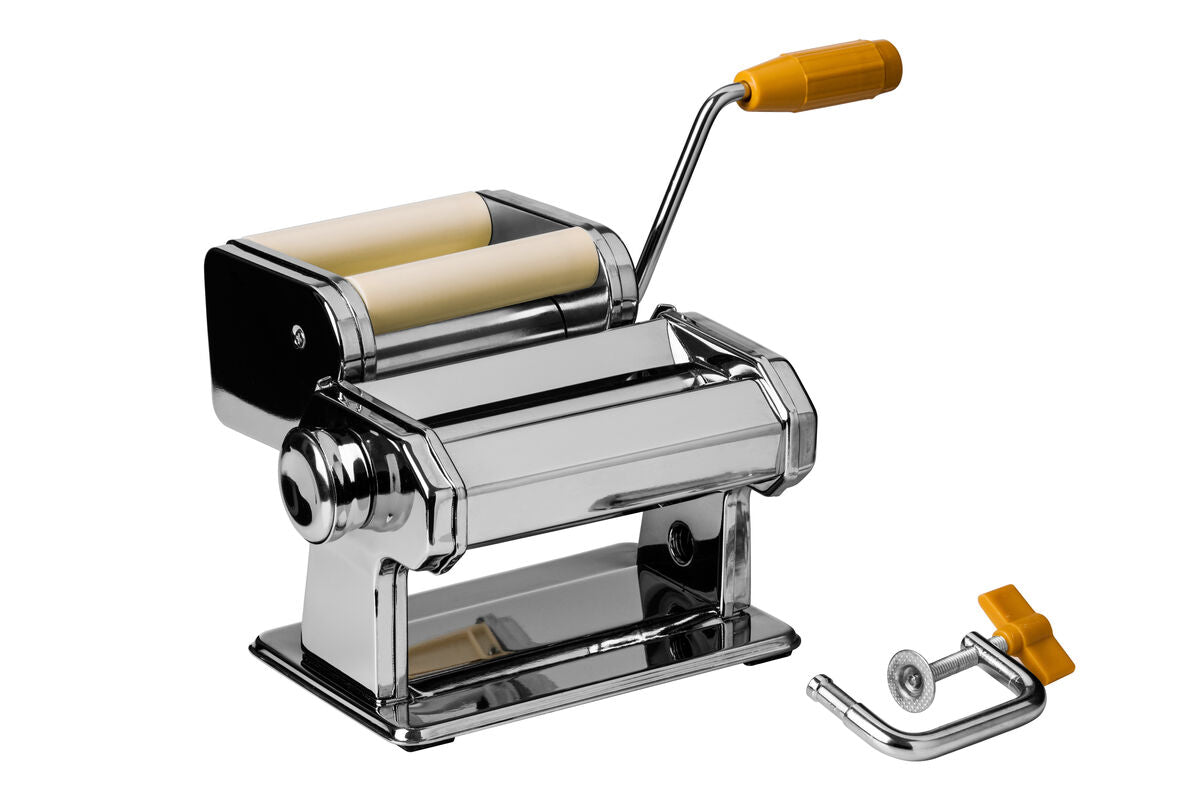 Pasta maker with attachments on a white background